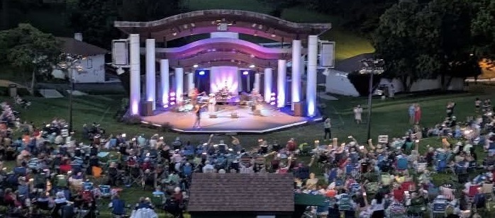Tupelo Honey performing at an outdoor amphitheater