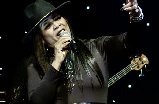 Cyriese Lambert singing on stage