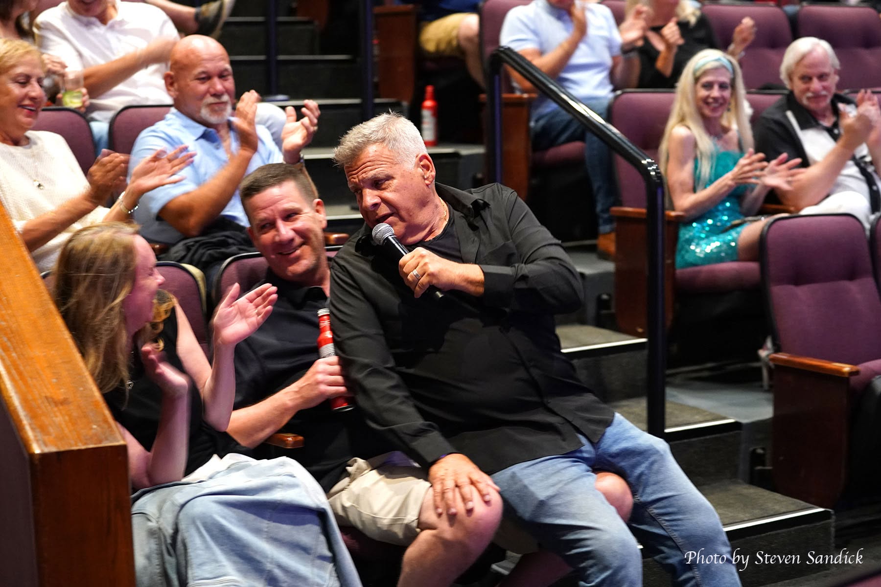 Jim DeRosa performing in the audience
